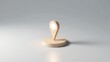 © antishock - Wooden location pin rests upon circular base. Minimalist design, soft lighting creates subtle shadow. Clean background emphasizes object.
