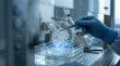© Creativeraf - Scientist handling engineered lung tissue sample in biotech lab