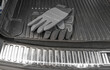© Olga - Gloved hand placing on car hood in garage or workshop, auto repair, car maintenance.