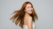© joy - Happy young asian woman with long healthy brown hair