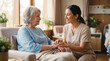 © Maksym - Nurse holding hands with elderly patient in comfortable hospital room