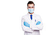 © deagreez - Close-up portrait of his he nice attractive cheerful experienced doc dentist holding in hands steel tools dental procedure center isolated on light white gray pastel color background