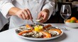 © Cheah - Chef expertly shucking oysters and arranging gourmet seafood platter with shrimp and lemon garnish