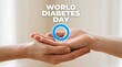 © ShaGraphi - Hands holding a blue circle symbol representing world diabetes day awareness and support for patients with chronic disease