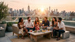 © PicoPolyArt - Diverse friends relaxing and laughing together on an urban rooftop terrace during golden hour