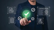 © MstJosna - Businessman touching digital screen with certification checkmark icon