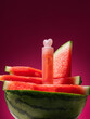 © Marc Tran/Stocksy - Watermelon slices with lip gloss