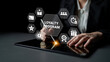 © InfiniteFlow - A professional actively engages with a loyalty program interface on a tablet, highlighting the importance of customer retention and innovative digital strategies. Ledger