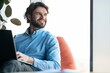 © Prostock-studio - Smiling Caucasian Man In His 30s Working On Laptop While Sitting In A Bright Modern Office. Focused On Task, Enjoying Productive Day In Professional Environment. Business Concept.