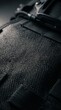 © Vladislav - Kevlar fiber weave texture on tactical gear close-up