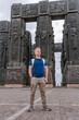 © KseniaJoyg - Young male tourist at the Chronicles of Georgia monument