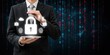 © tahir xh - Cyber security data protection concept photo. Businessman protecting padlock icon with digital binary code background. Information safety and privacy.