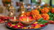 © Maksym Tereshchenko - Luxury Diwali decoration with ornate brass diyas, golden lanterns, fresh marigold garlands, red and gold textiles and colorful flower petals, elegant Indian interior with soft glowing lights, sophis