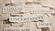 © Rafli - Newspaper headlines collage showing uncertainty, climate change, economy, and hope