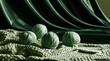 © Jack - Soft, verdant wool yarn balls sit on a tactile crochet blanket. Dark, smooth satin drapes behind add a luxurious contrast. Natural fibers gather for creation in a cozy crafting ambiance.