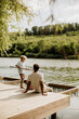 © BGStock72 - Father and son enjoy a peaceful fishing moment by the riverbank
