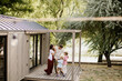 © BGStock72 - Joyful family gathering near the water with laughter and love in the air