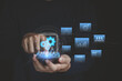 © MUNTHITA - Businessman using a smartphone to analyze tab data on business integration. System unification, digital transformation, process automation, enterprise workflow and technology alignment strategies.