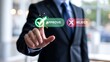 © Awais Haider - Businessman selecting approve or reject decision on digital interface