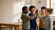 © Alva - Diverse group of happy school children giving a high five in the classroom.