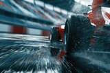 A close-up of a racing car tire speeding on a wet track, splashing water with dynamic motion and intense focus on grip and performance.