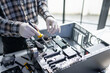 © Charlie's - IT Technician Fixing Desktop Computer PC Hardware for Troubleshooting Maintenance Upgrade and Modern Technology Support Services.