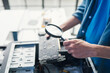 © Charlie's - Male IT Technician Repairing Computer Hardware and Troubleshooting Electronic Components for Modern Technology Maintenance Services