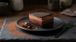 © Colorium Studio - A delicious square chocolate mousse cake slice served on a dark plate with berries on a rustic table. luxury bakery items
