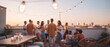 © itlada - Rooftop party with friends at sunset on an urban terrace with string lights and festive candles, creating an atmospheric blurred background for summer lifestyle and social event designs