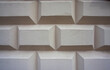 © 123108 Aneta - Biała ściana o oryginalnym wzorze - kostka, pudełka, prostokąty, wrażenie 3d. A white wall with a unique pattern—cubes, boxes, and a 3D effect.