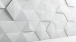 © MstNasima - Modern white geometric wall with triangular and pyramidal tiles under bright studio lighting. Abstract architectural background for interior design concepts.