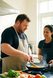 © Pixel-Shot - Healthy cooking and couple lifestyle, man and woman preparing fresh meal together in home kitchen with vegetables and frying pan on gas stove burner