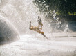 © Metadancer - South Asian child playing and splashing water at outdoor fountain