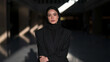 © BlackBridge Media - Confident Arab Businesswoman in Black Hijab and Suit