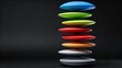 © Orod - Stacked colorful floating discs form a playful vertical sculpture for modern branding and design.