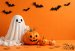 © Daniel - Cute white ghost sheet and Jack O Lantern pumpkin with bat silhouettes on orange background minimal with copy space for Halloween banner