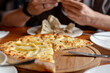 © KseniaJoyg - Traditional Georgian khachapuri served in a restaurant.