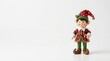 © mingnimit - Christmas Elf Figurine on a White Background