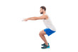 © deagreez - Full length, side view portrait of active, sporty, attractive person showing how it is right to make squats with straight hands, arms forward, isolated on white background