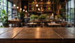 © MstSayla - Empty dark wooden table top with blurred restaurant interior background for product display