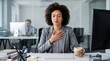 © Erni - Mindful Black Businesswoman Meditating at Office Desk with Coffee