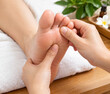 © Virinn gallary - Acupressure Foot Massage Focusing on Toes for Relaxation and Wellness