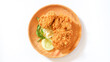 © Art Genie - Delicious crispy golden fried chicken pieces served on a wooden plate with fresh cucumber slice and basil garnish, isolated on a white background for fast food menu.