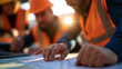 © Laura - Faceless power grid engineers reviewing an infrastructure map, coordinating maintenance and outage response routes, with copy space