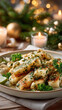 © syhin_stas - Cuban yuca con mojo on a festive holiday table with sparkling lights, pine branches, and white candles, presenting a traditional dish for christmas celebrations