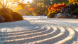 © Umechi - 砂紋が美しい枯山水の庭園に紅葉した木々が重なり合う夕暮れの風景　ローアングルから捉えた砂の波模様が手前に広がり、光と影のコントラストが強調された静寂で落ち着いた雰囲気の屋外写真　秋の季節の挨拶状やウェブサイトの背景、癒やしをテーマにした広告バナー、禅やマインドフルネスを紹介する資料の表紙、情緒的な空間デザイン