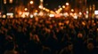 © MDNABIR - Large crowd of people enjoying a nighttime event with bright lights and celebration