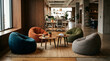 © Alfon - Bright contemporary office lounge with colorful bean bag seating.