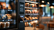 © Laura - Modern snack vending machine displayed inside a trendy cafe setting, contemporary retail concept, with copy space