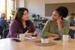 © Sugar Love Love - Two women having a supportive conversation at a community workshop